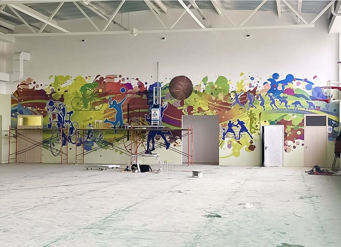 Impression murale theme sport dans un gymnase scolaire